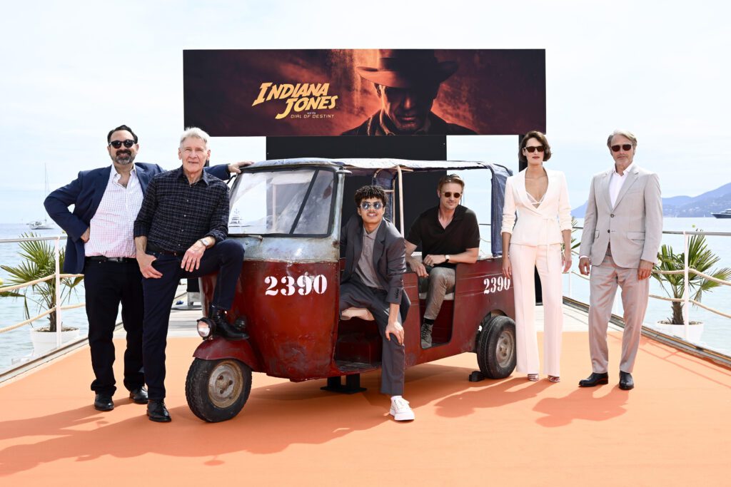 CANNES, FRANCE - MAY 18: (L-R) James Mangold, Harrison Ford, Ethann Isidore, Boyd Holbrook, Phoebe Waller-Bridge, and Mads Mikkelsen attend "Indiana Jones and The Dial Of Destiny" photocall at Carlton Pier on May 18, 2023 in Cannes, France. (Photo by Gareth Cattermole/Getty Images for Disney)