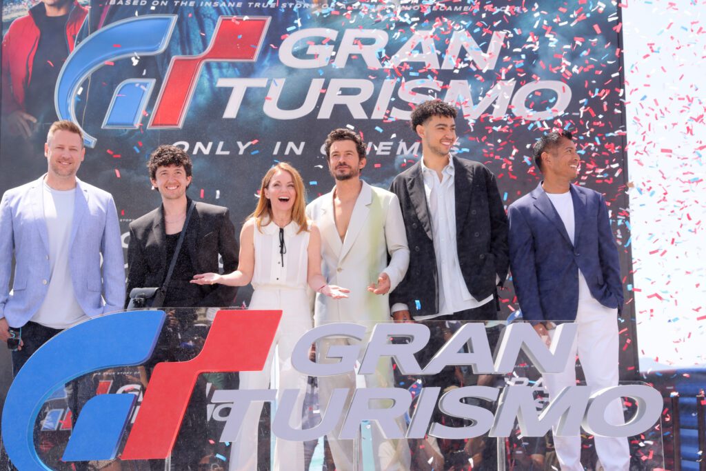 CANNES, FRANCE - MAY 26: GRAN TURISMO: THE MOVIE cast, (L-R) Neill Blomkamp, Maximilian Mundt, Geri Halliwell, Orlando Bloom, Archie Madekwe and Asad Qizilbash attend the 2023 Cannes Film Festival Photo Call on May 26, 2023 in Cannes, France. (Photo by Victor Boyko/Getty Images for Sony Pictures )