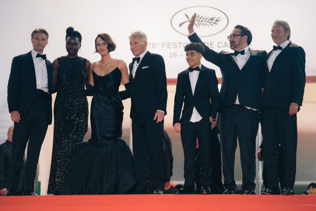 MAY 18, 2023 : Harrison Ford, Phoebe Waller-Bridge, Mads Mikkelsen, Boyd Holbrook, Ethann Isidore & James Mangold at the end of Indiana Jones and The Dial of Destiny screening during the 76th Cannes Film Festival.