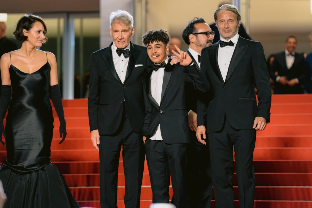 MAY 18, 2023 : Harrison Ford, Phoebe Waller-Bridge, Mads Mikkelsen, Boyd Holbrook, Ethann Isidore & James Mangold at the end of Indiana Jones and The Dial of Destiny screening during the 76th Cannes Film Festival.
