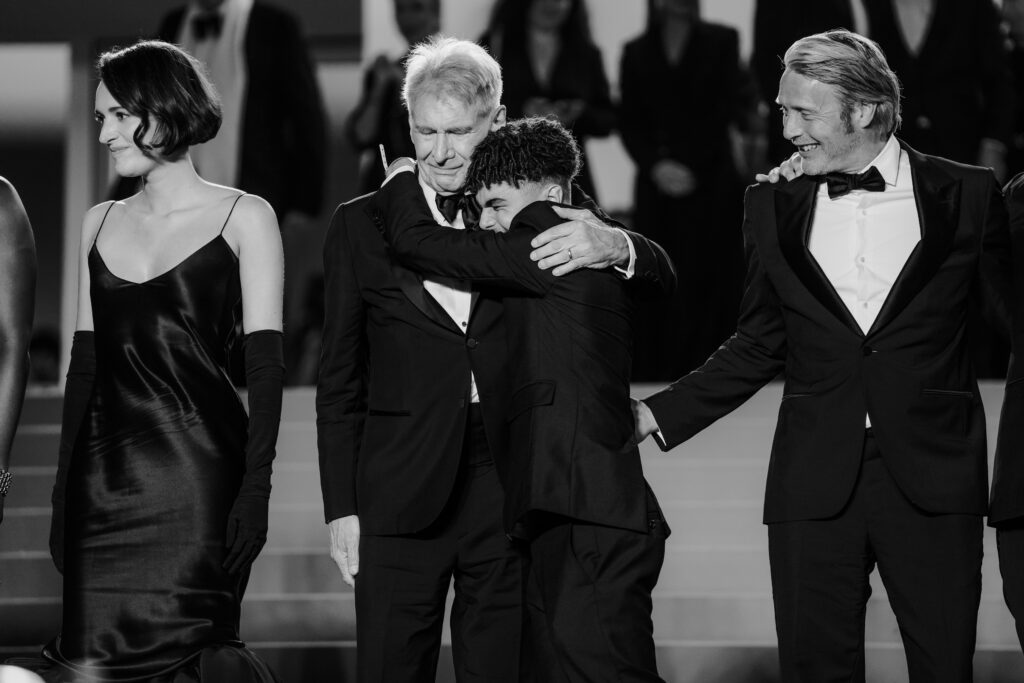 MAY 18, 2023 : Harrison Ford, Phoebe Waller-Bridge, Mads Mikkelsen, Boyd Holbrook, Ethann Isidore & James Mangold at the end of Indiana Jones and The Dial of Destiny screening during the 76th Cannes Film Festival.