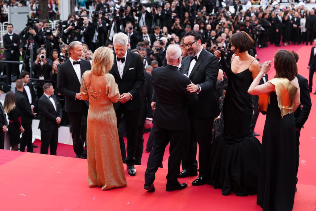 CANNES, FRANCE - MAY 18: Harrison Ford, James Mangold & Phoebe Waller-Bridge attends the screening of ‘Indiana Jones and The Dial of Destiny’ during the 76th International Cannes Film Festival at Palais des Festivals on May 18, 2023 in Cannes, France