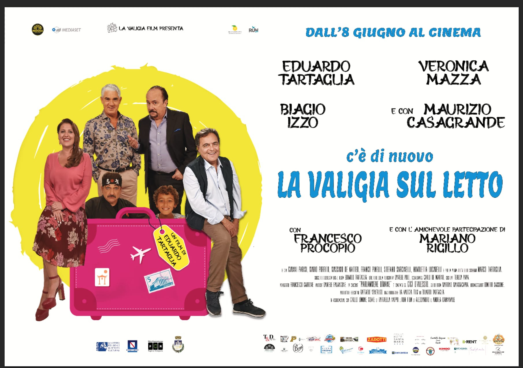 c'è di nuovo la valigia sul letto