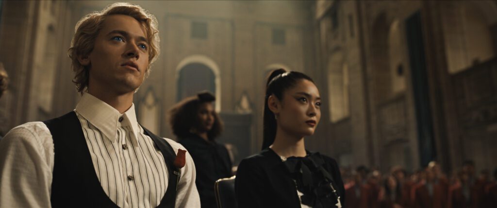 Tom Blyth as Coriolanus Snow and Ashley Liao as Clemensia Dovecote in The Hunger Games: The Ballad of Songbirds and Snakes. Photo Credit: Courtesy of Lionsgate