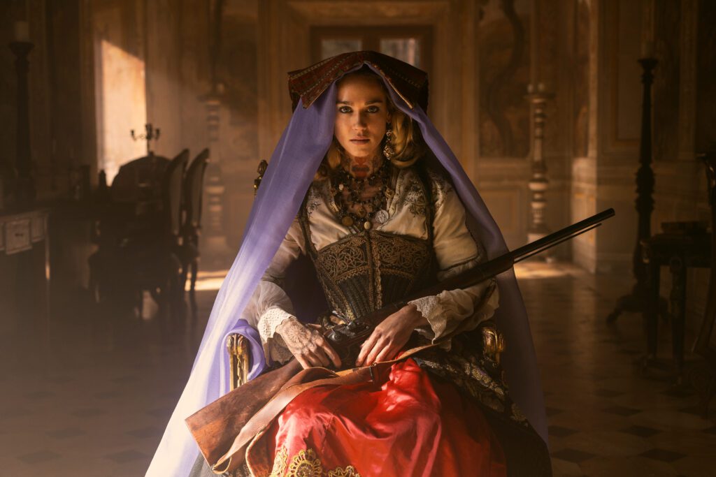 Briganti. Matilda Lutz as Michelina in Briganti. Cr. Francesco Berardinelli/Netflix © 2023