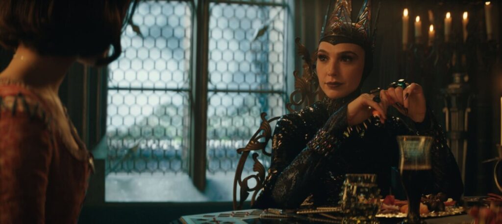 (L-R) Rachel Zegler as Snow White and Gal Gadot as Evil Queen in DISNEY's live-action SNOW WHITE. Photo courtesy of Disney. © 2024 Disney Enterprises, Inc. All Rights Reserved.